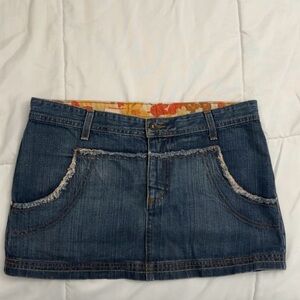 Chic Denim Mini Skirt with Floral Accent